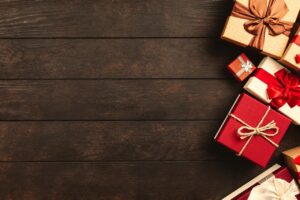 Gifts on wood background